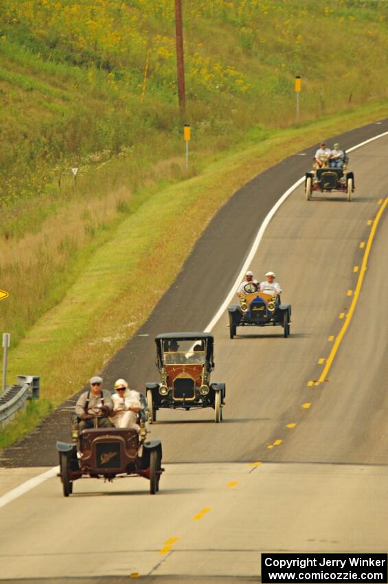 Jerry Kramer's 1906 Cadillac, Ron Fishback's 1912 Maxwell, Vince Smith's 1912 Maxwell and Brian Heyd's 1907 Cadillac