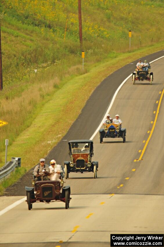 Jerry Kramer's 1906 Cadillac, Ron Fishback's 1912 Maxwell, Vince Smith's 1912 Maxwell and Brian Heyd's 1907 Cadillac