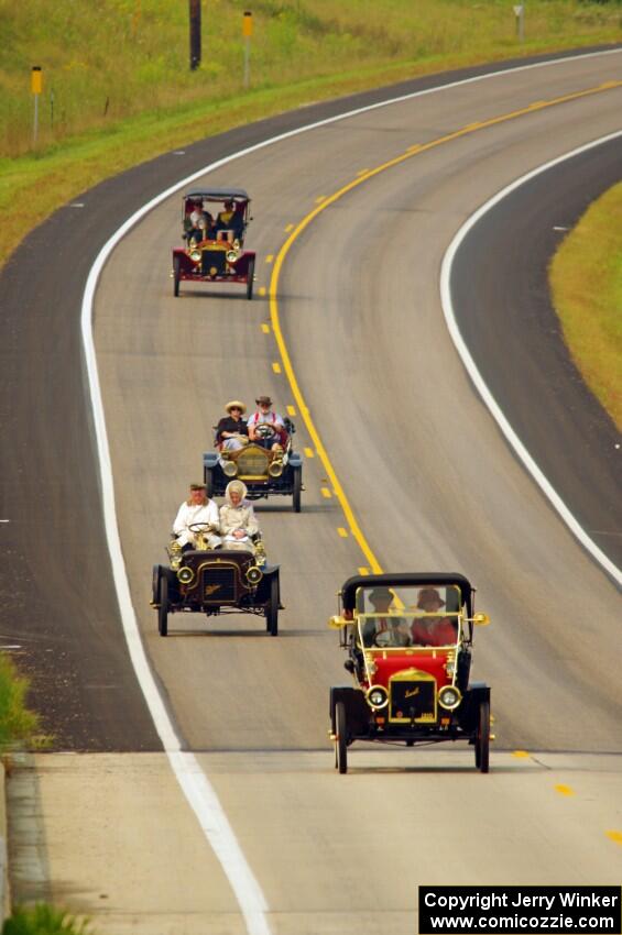 Jim Laumeyer's 1910 Maxwell, Peter McIntyre's 1906 Cadillac, and Floyd Jaehnert's 1908 Ford