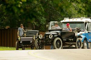 Tim Kelly's 1904 Ford pulls off the road as Mike Roach's 1914 Stanley Steamer makes sure all is okay.