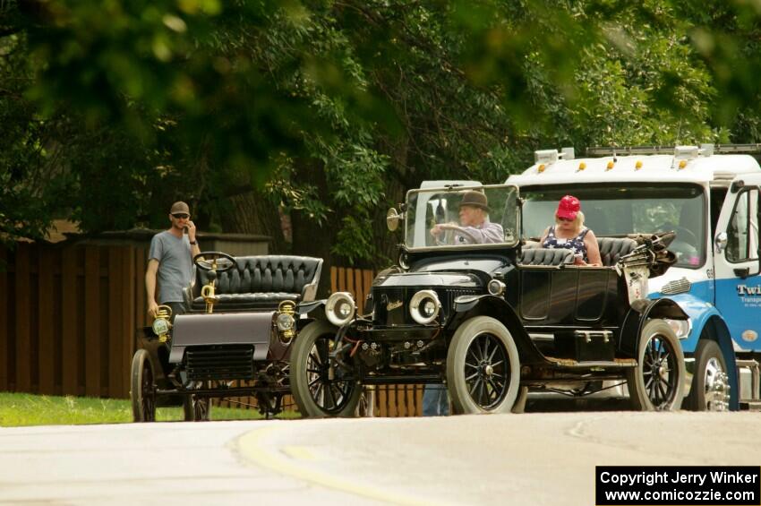 Tim Kelly's 1904 Ford pulls off the road as Mike Roach's 1914 Stanley Steamer makes sure all is okay.