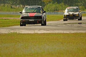 Locked Out Racing BMW 325is and Junk in the Trunk BMW 325i