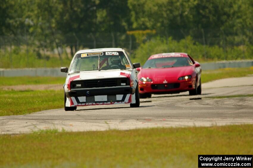 Virtually Worthless VW Golf and Blue Bayou Chevy Camaro