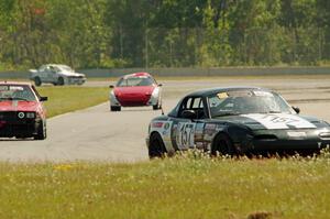 Transcendental Racing Mazda Miata, Dead Pedal Racing Maserati Biturbo and SoDak PetrolHeads Mazda RX-7