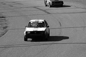Team Kaput VW Golf and Team Motorcrap Ford Mustang