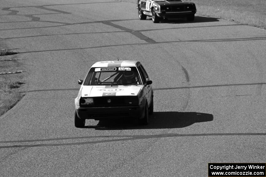Team Kaput VW Golf and Team Motorcrap Ford Mustang