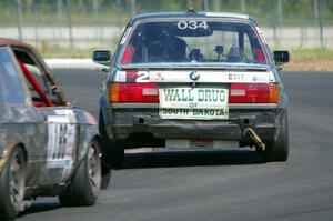 Chump Faces BMW 325is and Crank Yankers Racing BMW 325i