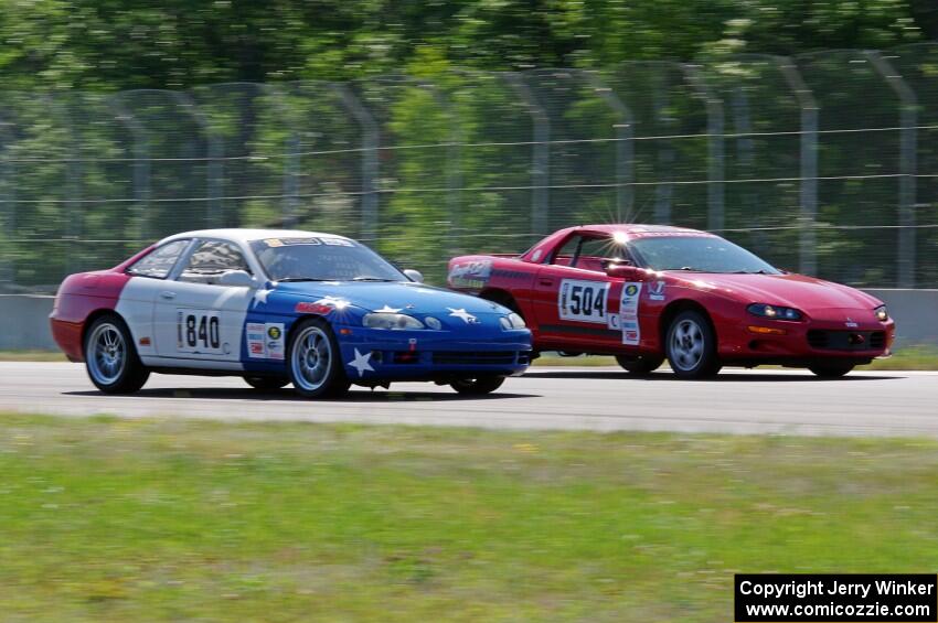 Nine Four Motorsports Lexus SC300 passes Blue Bayou Chevy Camaro