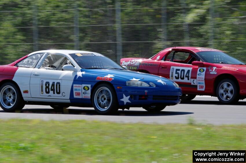 Nine Four Motorsports Lexus SC300 passes Blue Bayou Chevy Camaro