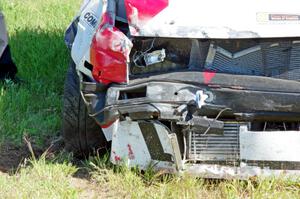 Virtually Worthless VW Golf had its day end after hitting the inside wall exiting turn 3.