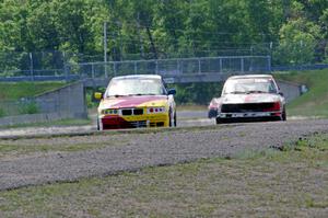 Dirty Side Down Racing BMW 325i and Crank Yankers Racing BMW 325i