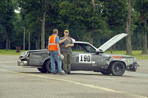 Northern Shiners Olds Cutlass back in the paddock, after wrecking on the main straight in the rain.