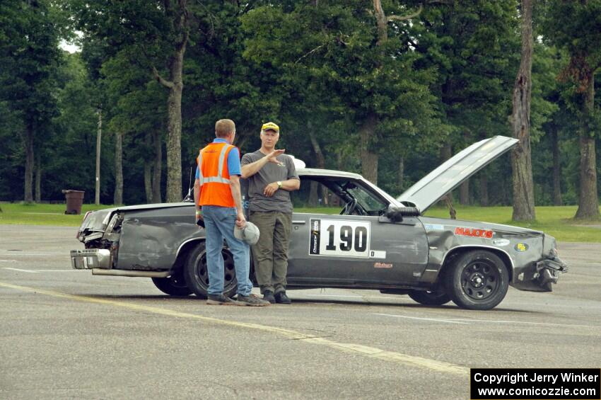 Northern Shiners Olds Cutlass back in the paddock, after wrecking on the main straight in the rain.