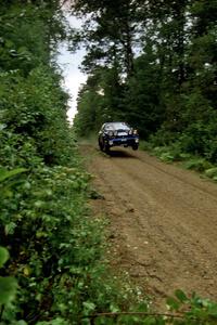 Mark Lovell / Steve Turvey Subaru WRX STi catches air at speed on SS2 (Stump Lake).