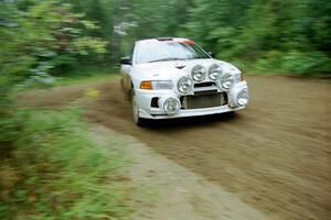 Tim Paterson / Scott Ferguson Mitsubishi Lancer Evo IV comes out of a 90-right on SS2 (Stump Lake).