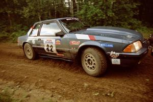 Mike Hurst / Rob Bohn Ford Mustang comes into a 90-right on SS2 (Stump Lake).