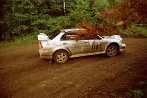 Mark Nelson / Alex Gelsomino Mitsubishi Lancer Evo VI comes out of a 90-right on SS2 (Stump Lake).