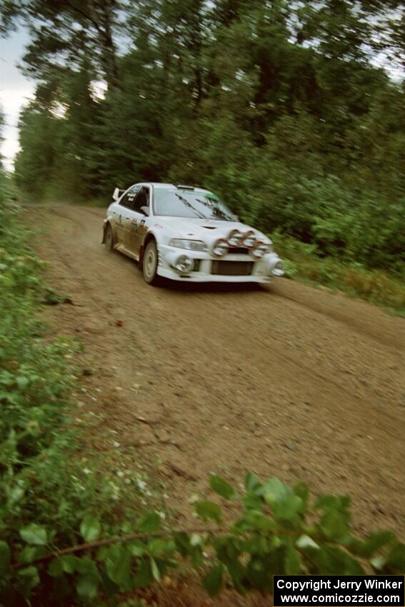 Seamus Burke / Frank Cunningham Mitsubishi Lancer Evo VI at speed on SS2 (Stump Lake).