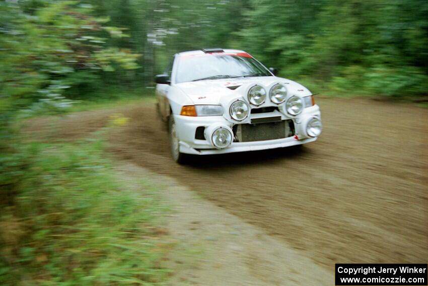 Tim Paterson / Scott Ferguson Mitsubishi Lancer Evo IV comes out of a 90-right on SS2 (Stump Lake).