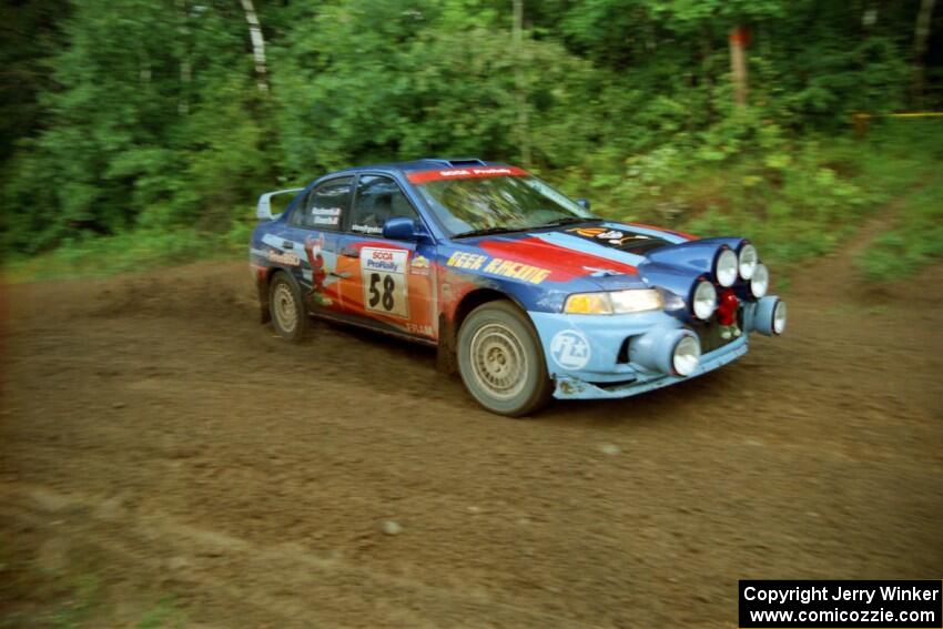 Alec Ellsworth / Steve Kaczkowski Mitsubishi Lancer Evo IV comes out of a 90-right on SS2 (Stump Lake).