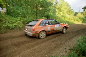 Gail Truess / Jeff Secor Mazda 323GTX comes out of a 90-right on SS2 (Stump Lake).