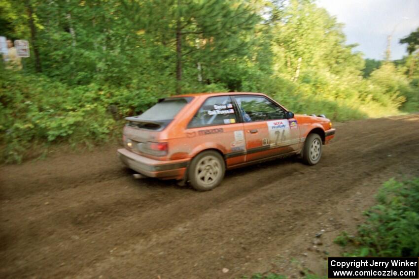 Gail Truess / Jeff Secor Mazda 323GTX comes out of a 90-right on SS2 (Stump Lake).