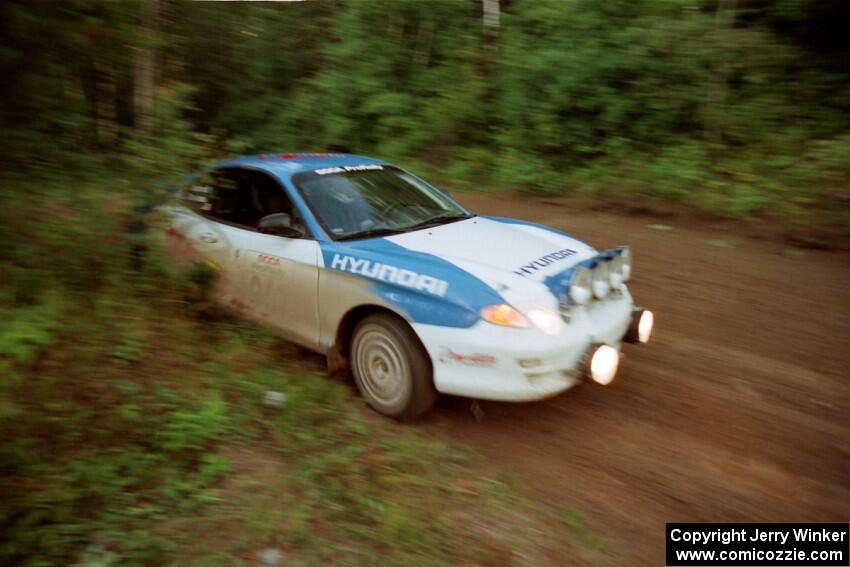 Dave Coleman / Paula Gibeault Hyundai Tiburon comes out of a 90-right on SS2 (Stump Lake).