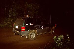 A sweep vehicle drives out of a 90-right on SS2 (Stump Lake).