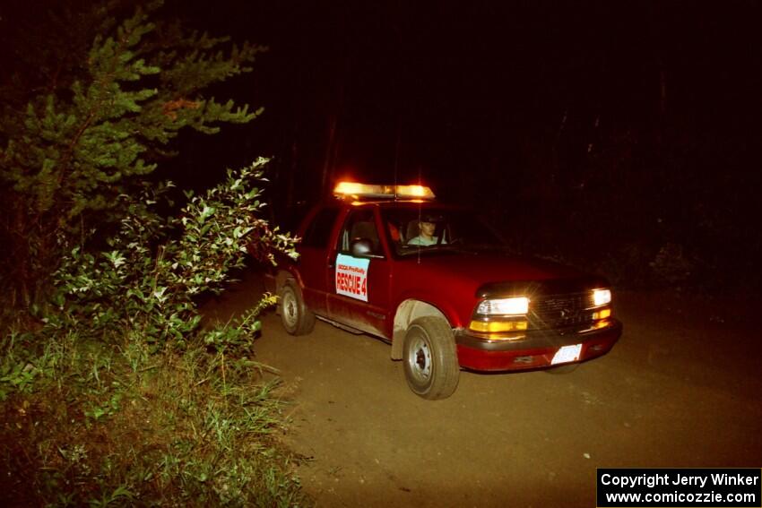 Paul Rosholt drives Rescue 4 out of a 90-right on SS2 (Stump Lake).