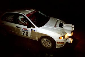 Paul Dunn / Rebecca Dunn Mitsubishi Lancer Evo IV on SS4 (Wolf Lake).