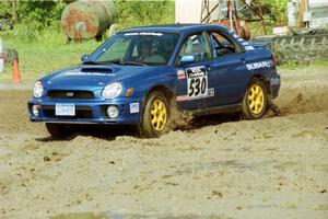 Doug Havir / Al Kintigh Subaru WRX slops through the mud on SS7 (Speedway Shenanigans).