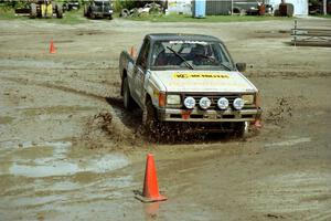 Bryan Ackerman / Sean Figgins Mitsubishi Mighty Max slops through the mud on SS7 (Speedway Shenanigans).