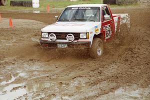 Jim Cox / Kaari Cox Chevy S-10 slops through the mud on SS7 (Speedway Shenanigans).