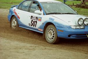 Micah Wiitala / Jared Kemp Saturn SL2 slops through the mud on SS7 (Speedway Shenanigans).