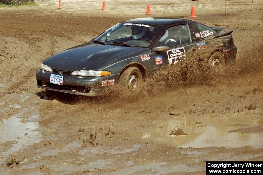 Paul Peters / Bob Anderson Mitsubishi Eclipse GSX slops through the mud on SS7 (Speedway Shenanigans).