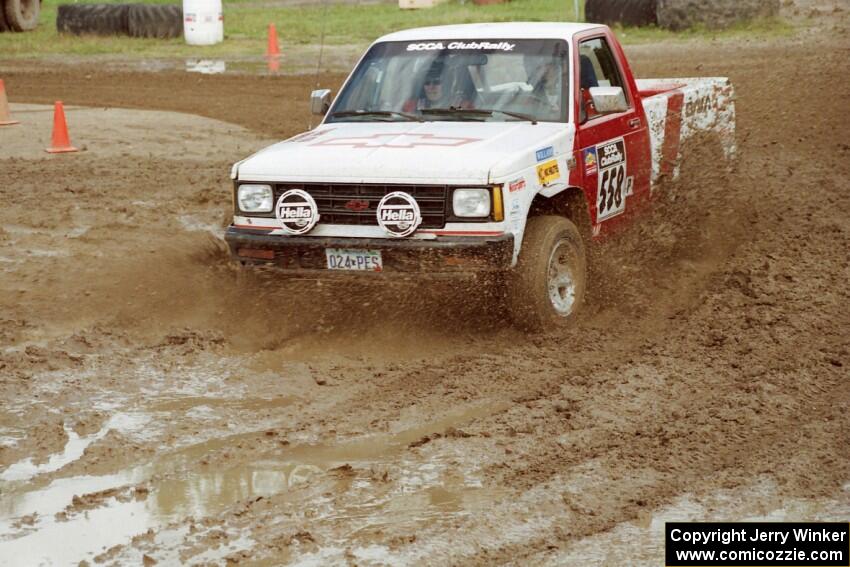 Jim Cox / Kaari Cox Chevy S-10 slops through the mud on SS7 (Speedway Shenanigans).