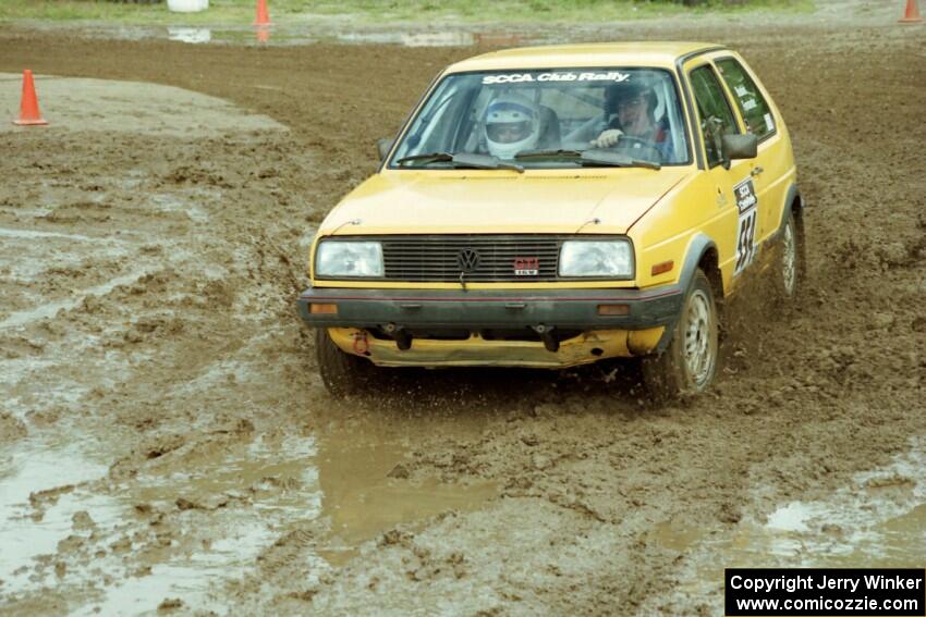 Mark Buskirk / Paul Fernandez VW GTI slops through the mud on SS7 (Speedway Shenanigans).