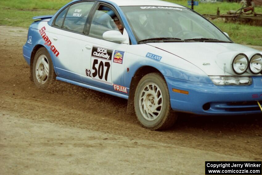 Micah Wiitala / Jared Kemp Saturn SL2 slops through the mud on SS7 (Speedway Shenanigans).