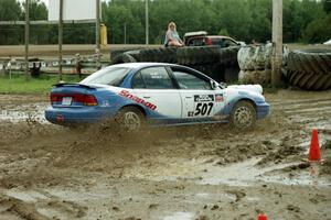 Micah Wiitala / Jared Kemp Saturn SL2 slops through the mud on SS7 (Speedway Shenanigans).