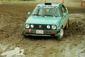 Larry Warrington / Damien Crane VW Jetta slops through the mud on SS7 (Speedway Shenanigans).