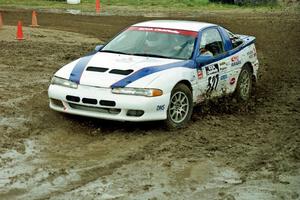 Chris Gilligan / Joe Petersen Mistubishi Eclipse GSX slops through the mud on SS7 (Speedway Shenanigans).