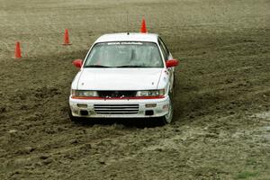 Todd Jarvey / Rich Faber Mitsubishi Galant VR-4 slops through the mud on SS7 (Speedway Shenanigans).