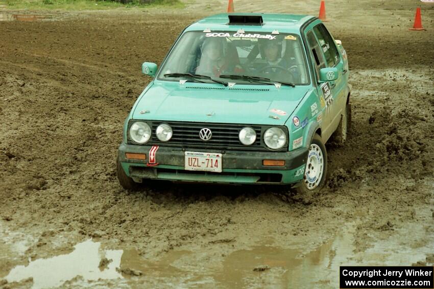 Larry Warrington / Damien Crane VW Jetta slops through the mud on SS7 (Speedway Shenanigans).
