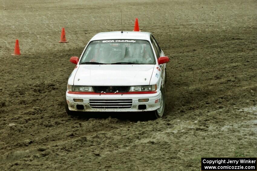 Todd Jarvey / Rich Faber Mitsubishi Galant VR-4 slops through the mud on SS7 (Speedway Shenanigans).