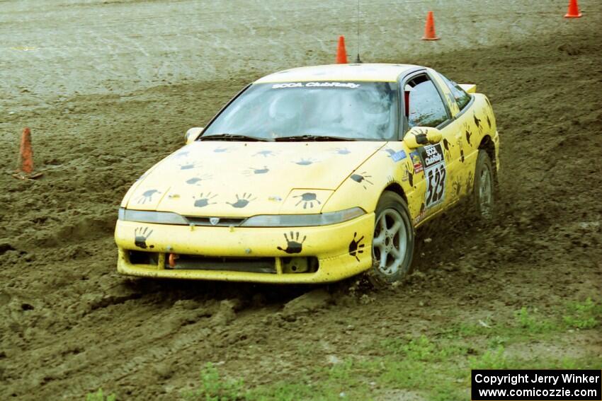 Rod Dean / Nichole Dean Plymouth Laser RS slops through the mud on SS7 (Speedway Shenanigans).