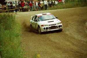 Tim Paterson / Scott Ferguson Mitsubishi Lancer Evo IV at the spectator point on SS9 (The Spurs).