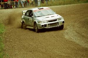 Mark Nelson / Alex Gelsomino Mitsubishi Lancer Evo VI at the spectator point on SS9 (The Spurs).