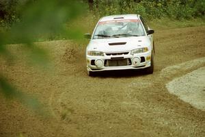 Paul Dunn / Rebecca Dunn Mitsubishi Lancer Evo IV at the spectator point on SS9 (The Spurs).