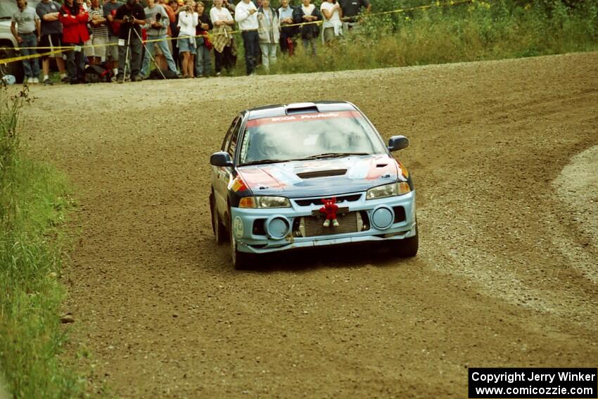 Alec Ellsworth /	Steve Kaczkowski Mitsubishi Lancer Evo IV at the spectator point on SS9 (The Spurs).