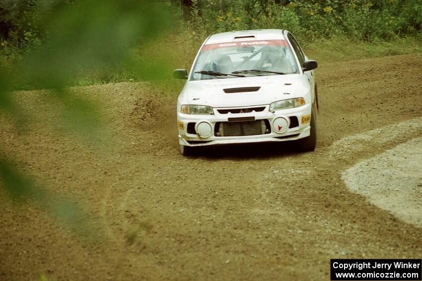 Paul Dunn / Rebecca Dunn Mitsubishi Lancer Evo IV at the spectator point on SS9 (The Spurs).